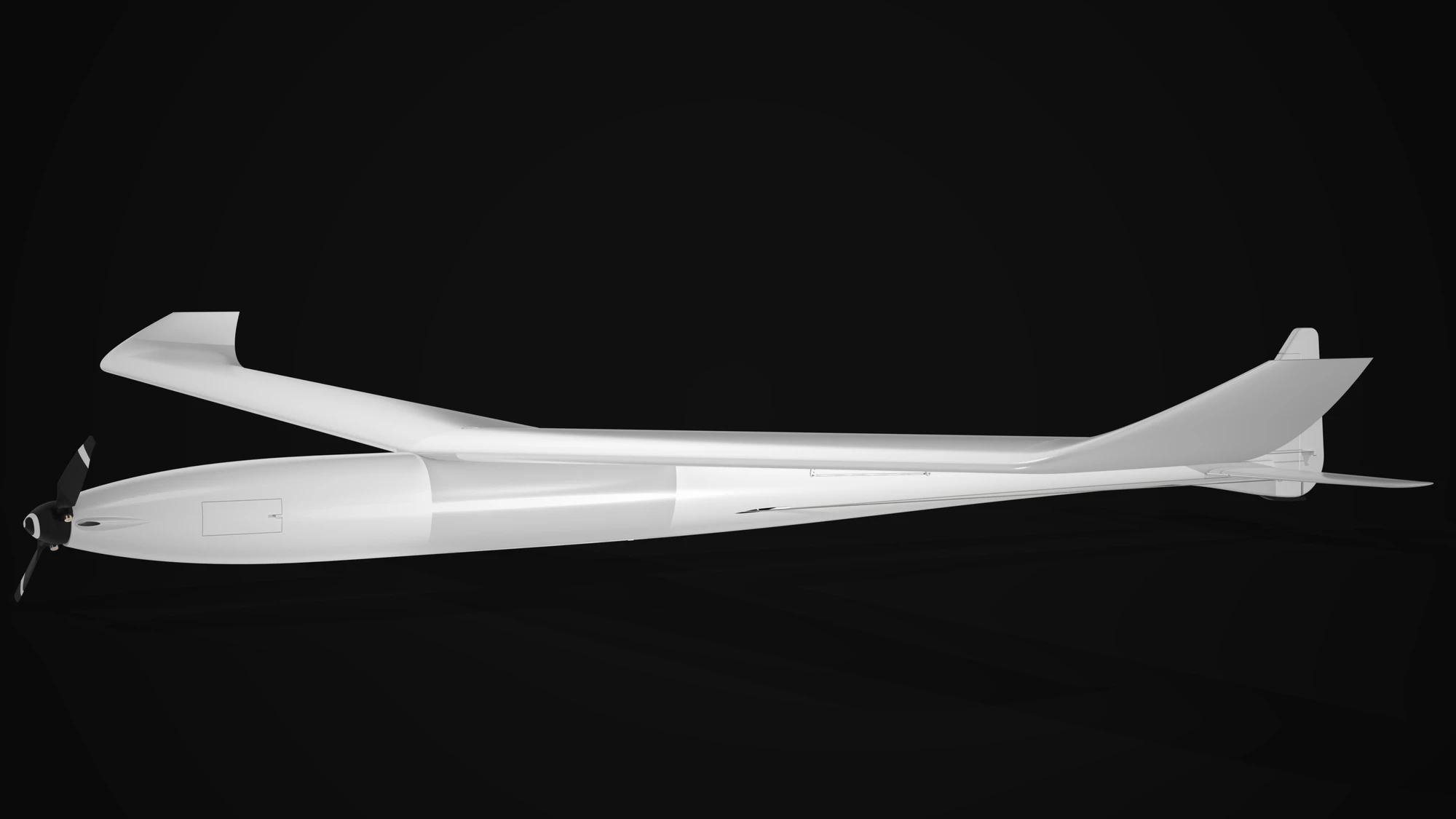 The aircraft seen from low and ahead, rendered in white on black: the nose and propeller close at the left, the fuselage running away to the fin and stabiliser at the right, and the wing crossing above it with the winglet at its far tip.